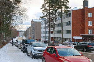 Cars parked by the side of the road in Haaga.