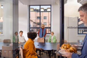 People in a meeting room.