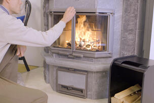 Wood burning in a fireplace.