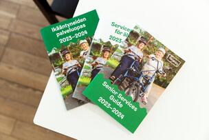 Senior Services Guide on a table