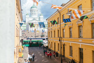 View from Sofiankatu to Senate square. There are people on the street.